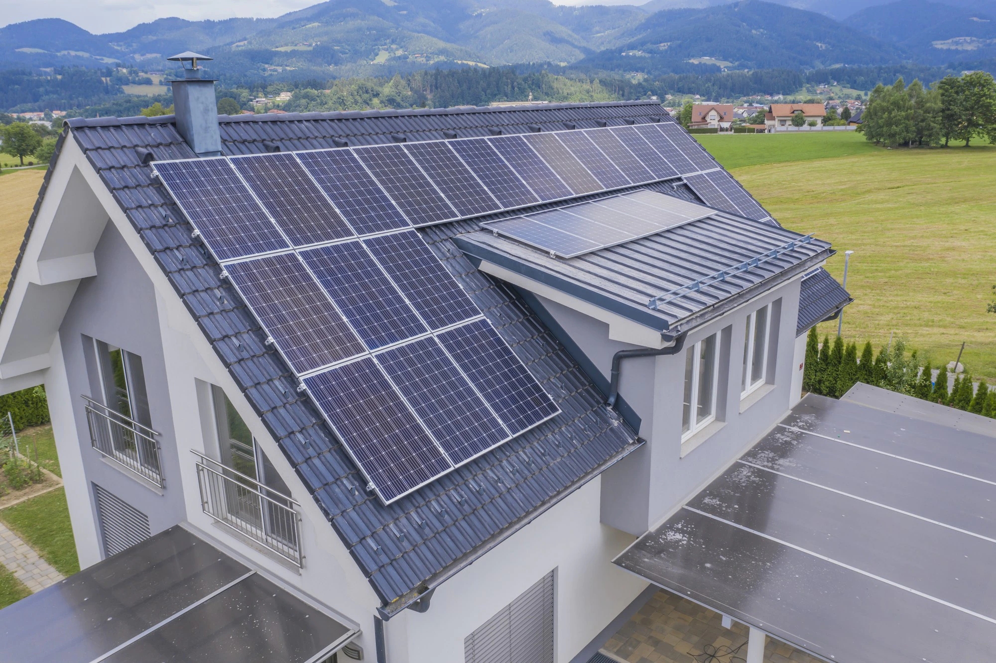 aerial-view-private-house-with-solar-panels-roof_181624-14677.webp.jpg